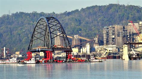 Barges float Ohio River bridge to permanent location | WKBN.com