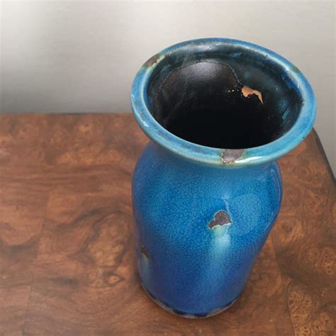 Blue ceramic vase. 6” high 2.75” in diameter... - Depop