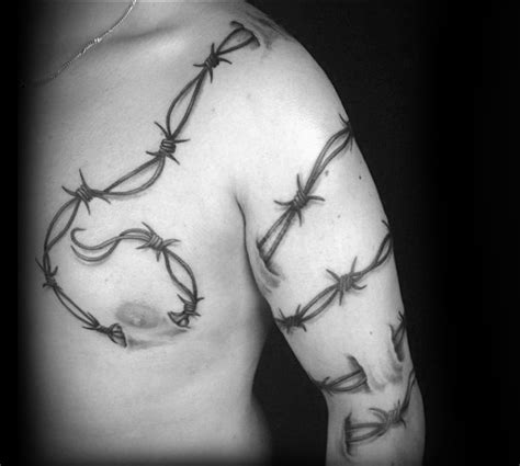 20 Barbed Wire Tattoos With Powerful and Creative Meanings - TattoosWin