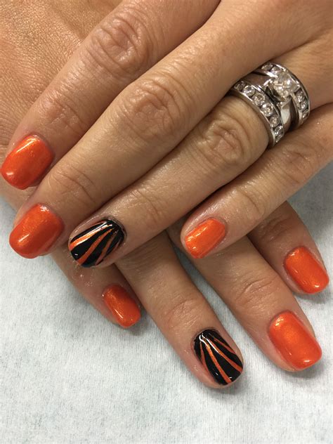 Make A Bold Statement With Orange And Black Nail Designs – The FSHN