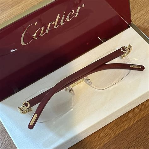 Cartier CT0186O FW23 Red Rimless Glasses | Grailed