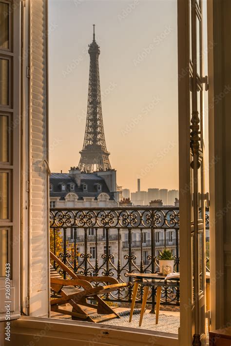 beautiful paris balcony at sunset with eiffel tower view Stock Photo ...