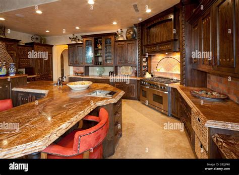 Contemporary kitchen interior design in mansion Stock Photo - Alamy