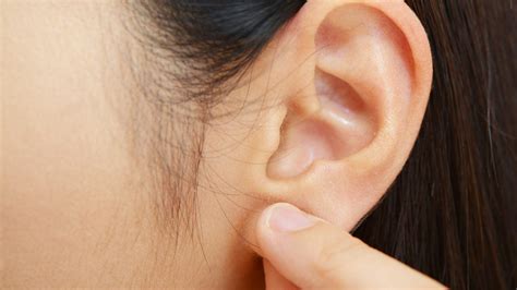 Pimple on the earlobe: Treatments, causes, and prevention