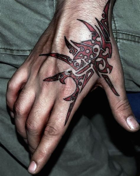 35 Beautiful Hand Tattoo Designs | Tribal hand tattoos, Hand tattoos ...