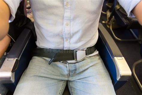 Male Passenger with Seat Belt Fastened while Sitting on Airplane for ...