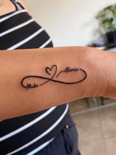 Infinity Tattoo With Names | Infinity tattoo designs, Wrist tattoos for ...