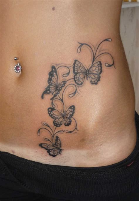 Butterfly Lower Side Stomach Tattoos For Females - SCRIBB LOVE TATTOO ...