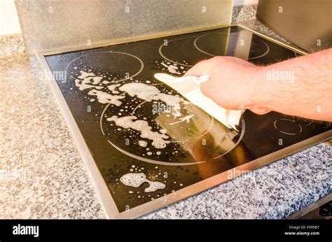 Ceramic hob, induction hob cleaning Stock Photo - Alamy