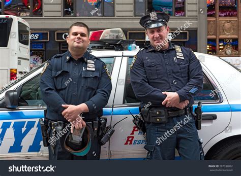 New York City - May 2015: Nypd Police Officers At Times Square. The New ...