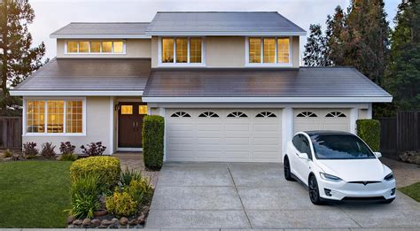 Tesla hints at serious Solar Roof push with roofers' hiring ramp across ...