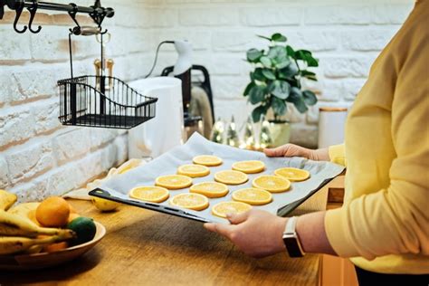 Premium Photo | How to dry orange slices for holiday decor process of ...