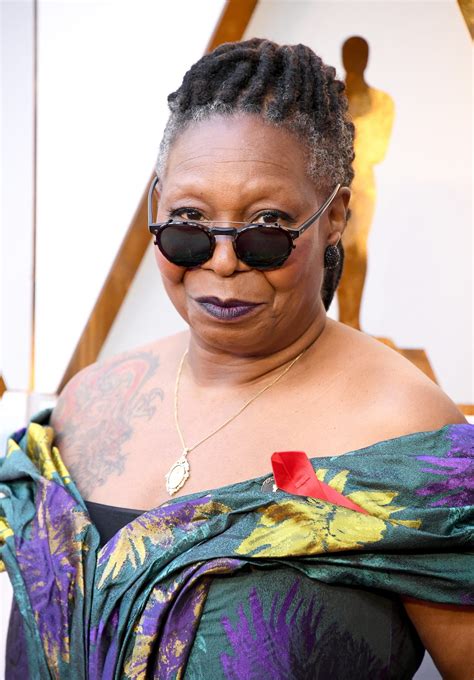 Whoopi Goldberg's Tattoo At The 2018 Oscars Red CarpetHelloGiggles