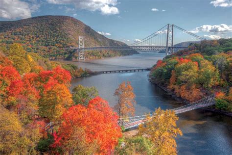 Autumn view of Bear Mountain Bridge with the CSX railroad bridge and ...