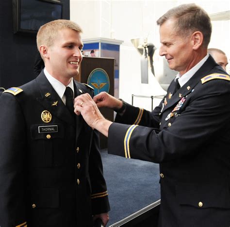 Father gives son his wings during graduation ceremony | Article | The ...