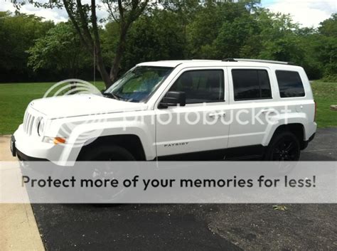 White jeep patriot black rims