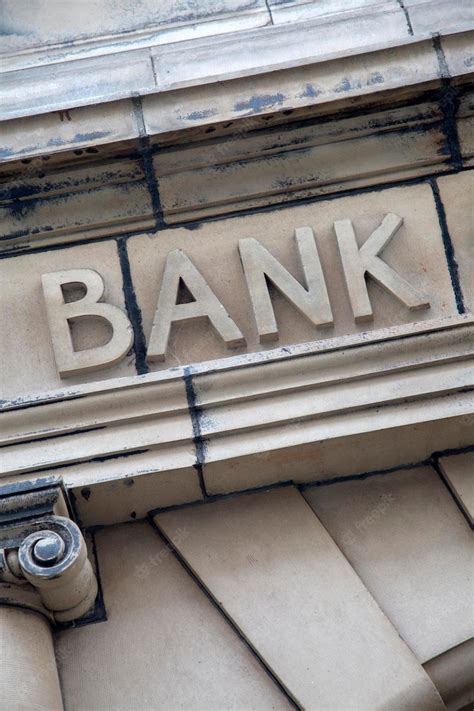 Premium Photo | Bank Sign on Building Facade