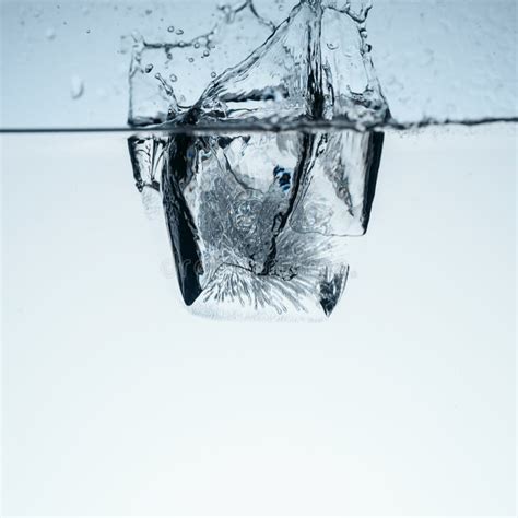 Ice Cube in Water with Splash Stock Image - Image of simple, simplicity ...