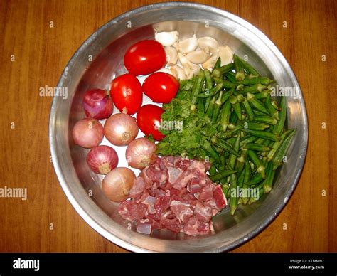 Bamje ingredients before cutting Stock Photo - Alamy