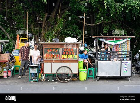 jakarta, indonesia - 2019.12.20: men at foodstalls (street restaurant ...