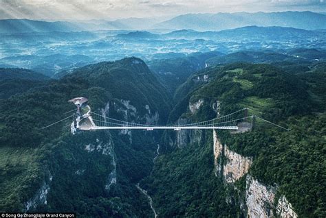 China's terrifying glass bridge is set to re-open after being forced to ...