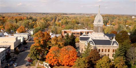 Aerial photo of downtown Mason, Michigan with the courthouse rising ...