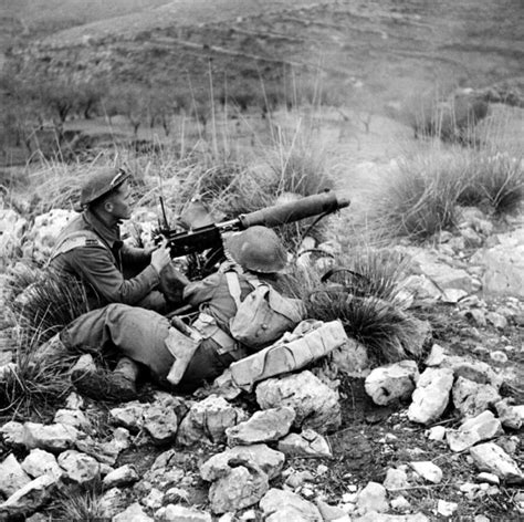 Anti-Worlds: New Zealand troops fire on Axis positions during ...