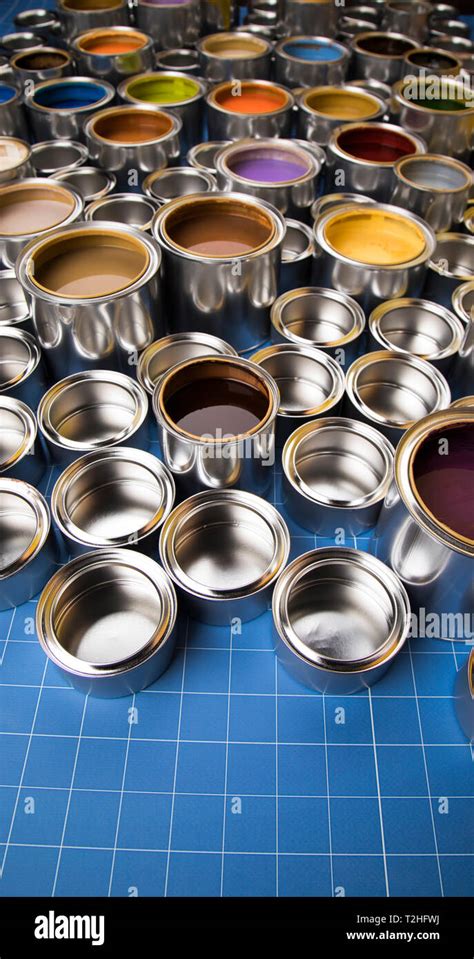 Metal cans with color paint Stock Photo - Alamy