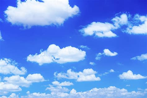 Fluffy White Clouds In A Blue Sky by Emrah Turudu