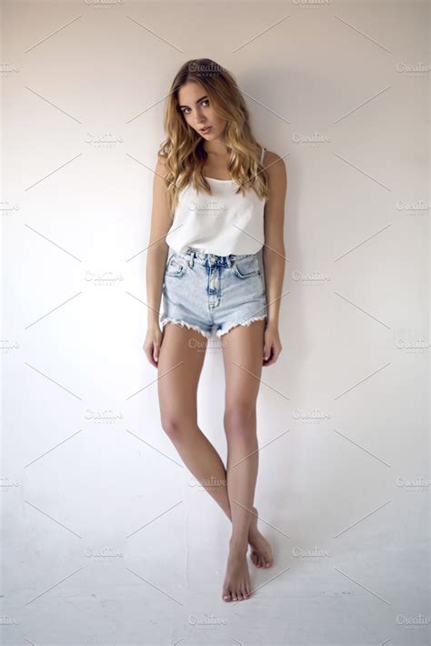 young sexy woman wearing jean shorts | High-Quality People Images ...