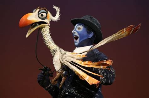 Tony Freeman handles the puppet Zazu, the high strung and easily ...