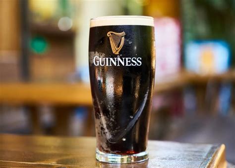 The History and Symbolism of the Guinness Logo - Free Logo Design