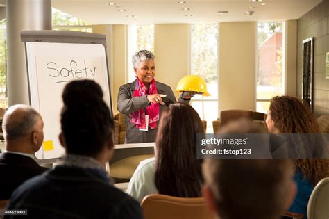 Safety In The Workplace Presentation With Office Workers High-Res Stock ...