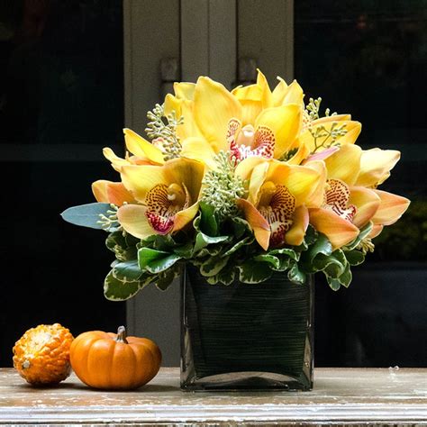 yellow cymbidium orchid arrangement in New York, NY | New York Plaza ...