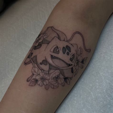 Bulbasaur Tattoo | Pokemon tattoo, Tattoos, Full neck tattoos