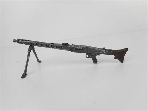 REPLICA OF A WWII GERMAN SOLDIER WITH MG42 MACHINE GUN - Switzer's ...