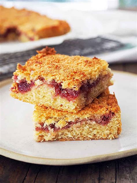 Easy Coconut Slice with Jam - Belly Rumbles