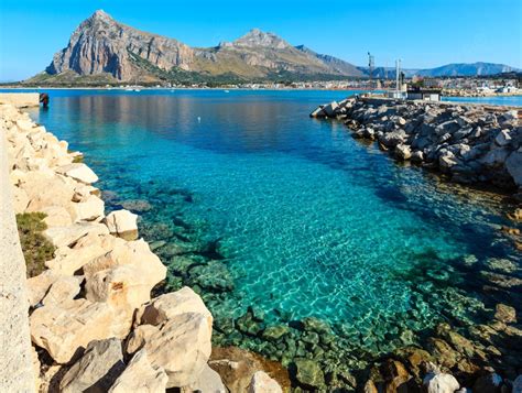 San Vito Lo Capo Beach With Clear Azure Water And Monte Monaco In Far ...