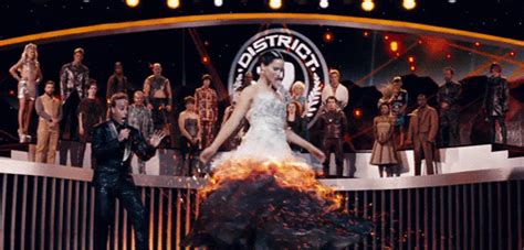 Katniss' fire dress in The Hunger Games. | Wedding movies, Movie ...