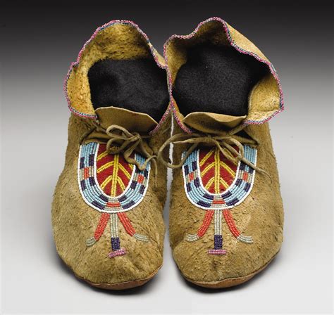 A PAIR OF BLACKFEET BEADED HIDE MOCCASINS. . c. 1900 . ... | Lot #77098 ...