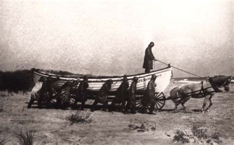 The U.S. Lifesaving Service, members of whom are shown above hauling a ...