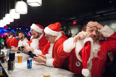 Annual SantaCon Pub Crawl Held In New York City