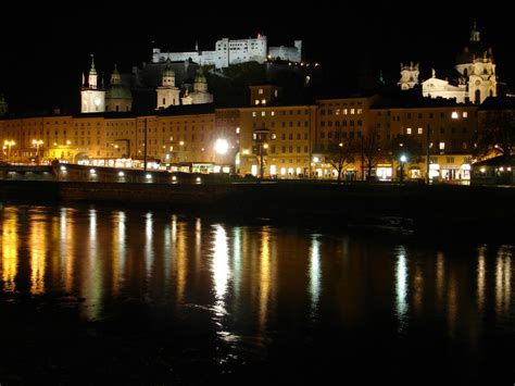 The fortress, Cathedral, and river at night in Salzburg, Austria image ...