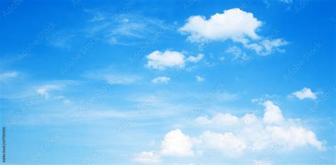 Sunny background, blue sky with white clouds Stock Photo | Adobe Stock