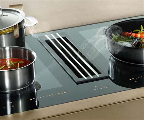 The Miele TwoinOne induction hob has an integrated extractor with a ...