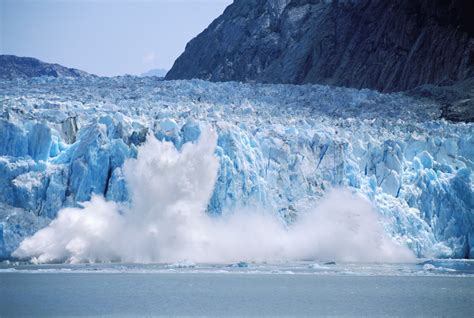 calving-at-dawes-glacier-2 - Alaska Pictures - Alaska - HISTORY.com