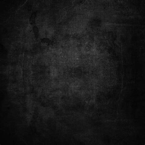 Abstract grunge texture on black fabric