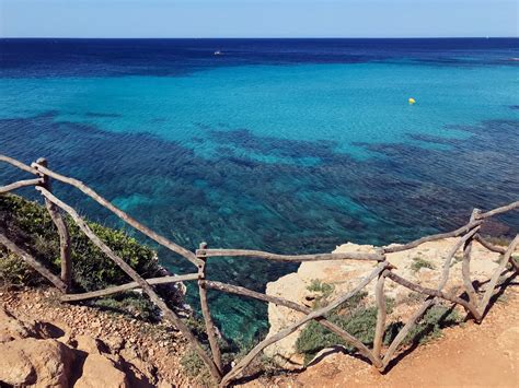 Visit Santo Tomas Beach in Menorca | Expedia