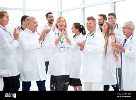 group of diverse smiling doctors applauding together Stock Photo - Alamy