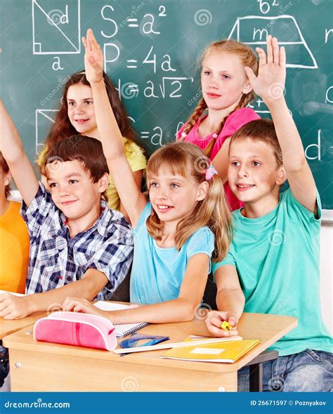 School Child Sitting in Classroom. Stock Image - Image of happy ...